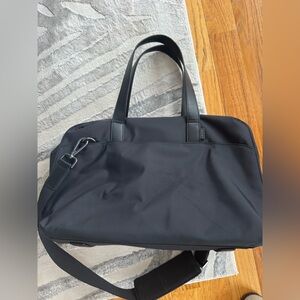 AWAY brand overnight bag.